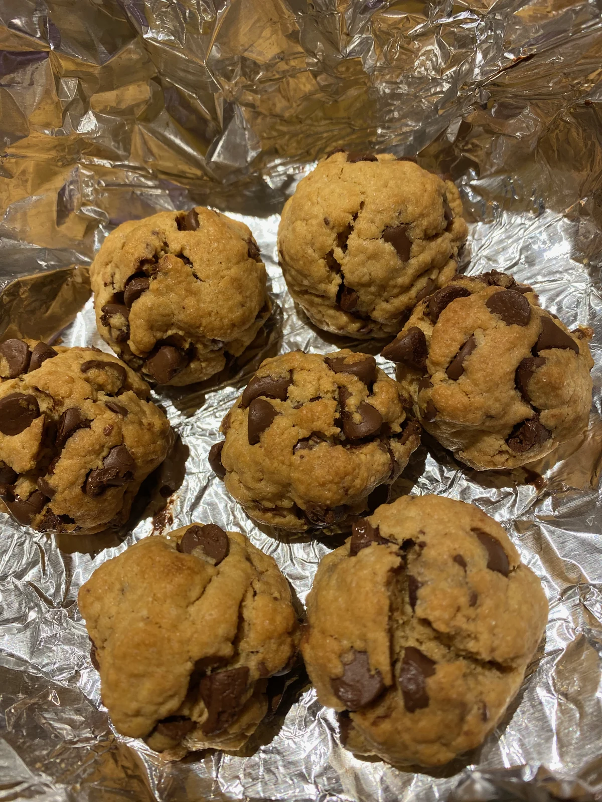 Same thick rounded cracked cookies and arrangement as existing chunky-cookie photo; different view/framing.